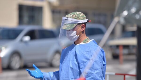 Военный медик на блокпосту в Хашми, муниципалитет Сагареджо. Ситуация в Грузии в связи с коронавирусом - Sputnik Грузия