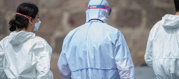 ექიმები დამცავ კოსტიუმებში ექიმები დამცავ კოსტიუმებში - Sputnik საქართველო