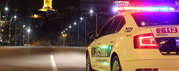 Машина патрульной полиции в столице Грузии во время комендантского часа - Sputnik Грузия