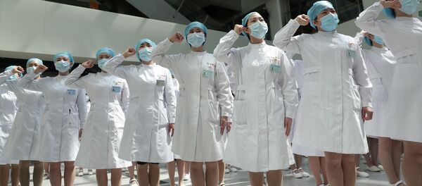 Медсестры во время мероприятия по случаю Международного дня медсестер в больнице, Китай - Sputnik Грузия