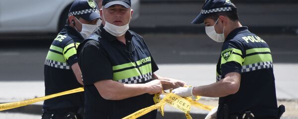 Сотрудники полиции на месте чрезвычайного происшествия  - Sputnik Грузия