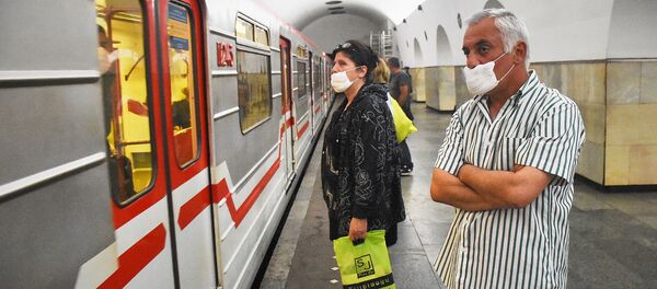  Городской транспорт. Пассажиры в масках в метро - Sputnik Грузия