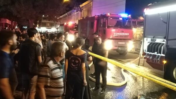 Крупный пожар на рынке в районе Варкетили. Фото очевидца с места событий - Sputnik Грузия