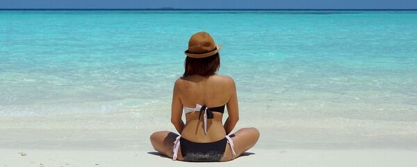 ქალი პლაჟზე ქალი პლაჟზე - Sputnik საქართველო