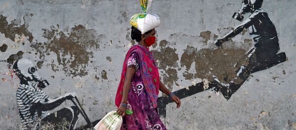 ქალი სამედიცინო  ნიღბით მუმბაიში ქალი სამედიცინო  ნიღბით მუმბაიში - Sputnik საქართველო